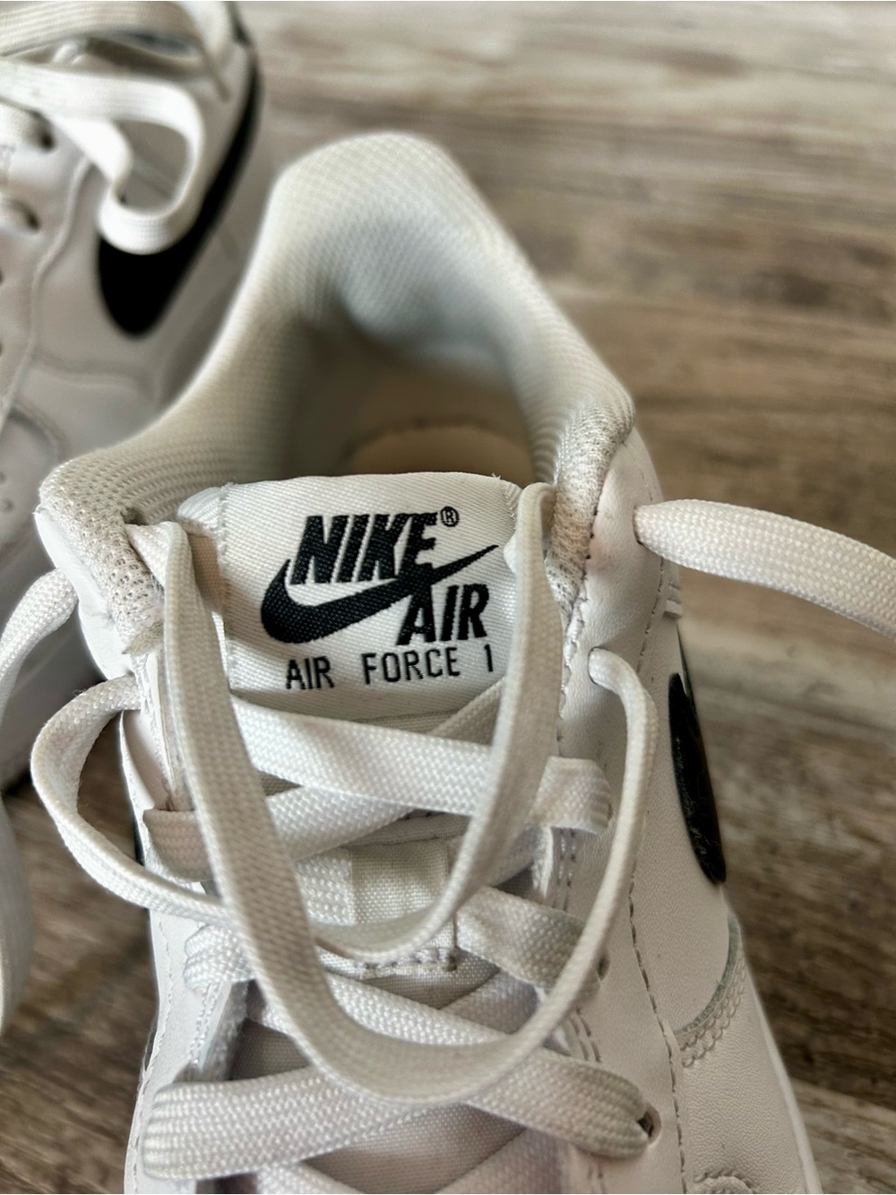 Nike Air Force 1 White with Black Swoosh Sneakers